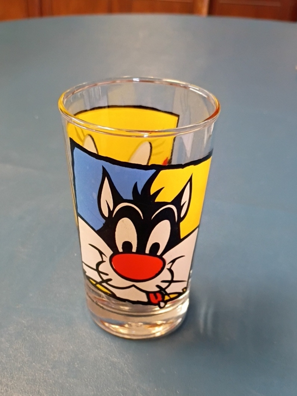 Warner Bros. Sylvester Cartoon Juice Glass with Red Nose and Blue/Yellow Panels